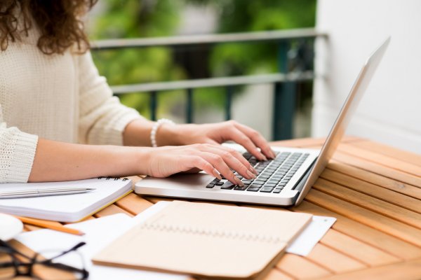 depositphotos_85881622-stock-photo-woman-working-on-laptop