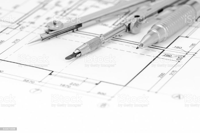 floor plan background with drawing compass and pencil